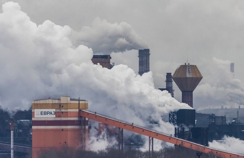 Logos of EVRAZ group are seen on buildings of Nizhny Tagil metallurgical combinate NTMK in in Nizhny Tagil