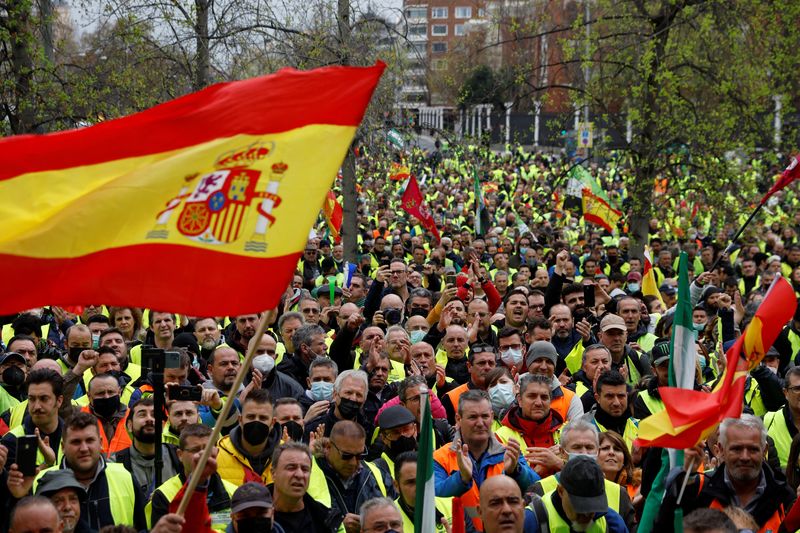 Striking truck drivers and supporters protest over high fuel prices and working conditions, in Madrid