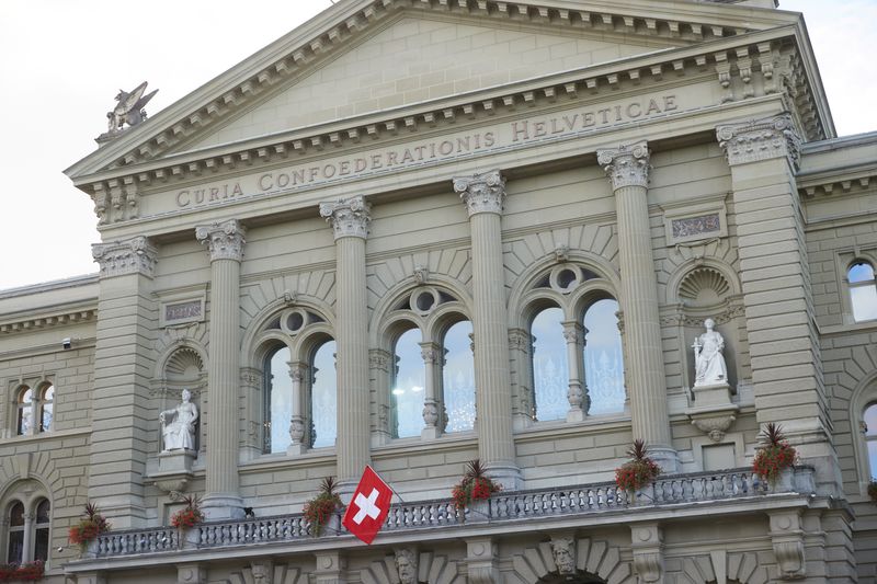A Swiss flag is pictured on the Swiss Parliament Building (Bundeshaus) in Bern