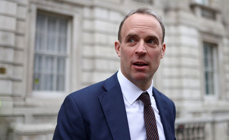 Britain's Deputy PM and Justice Secretary Raab walks outside the Cabinet Office in London