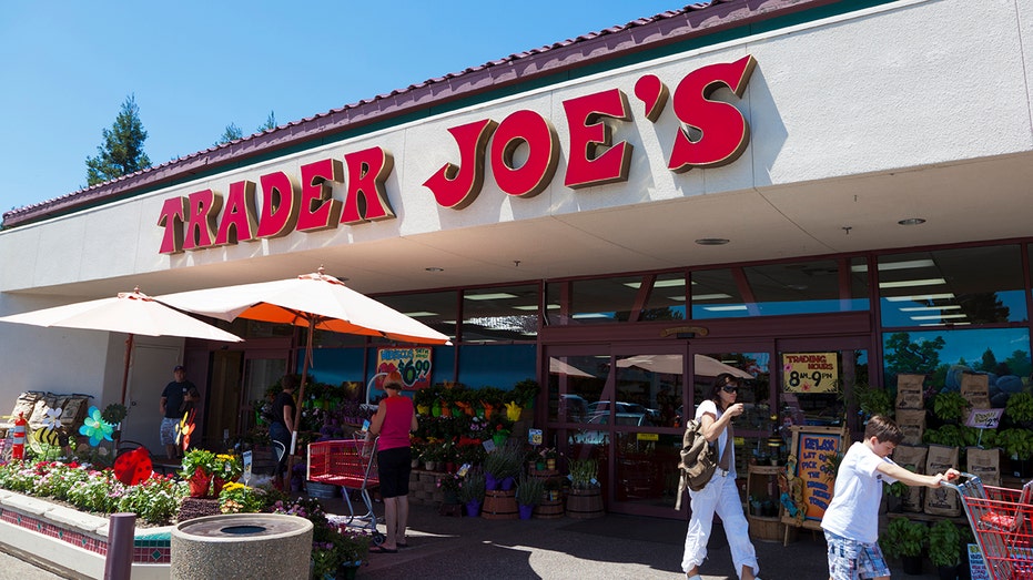 Shoppers going in and out of Trader Joe's grocery store on a sunny summer day on July 23, 2011, in Fair Oaks, California.
