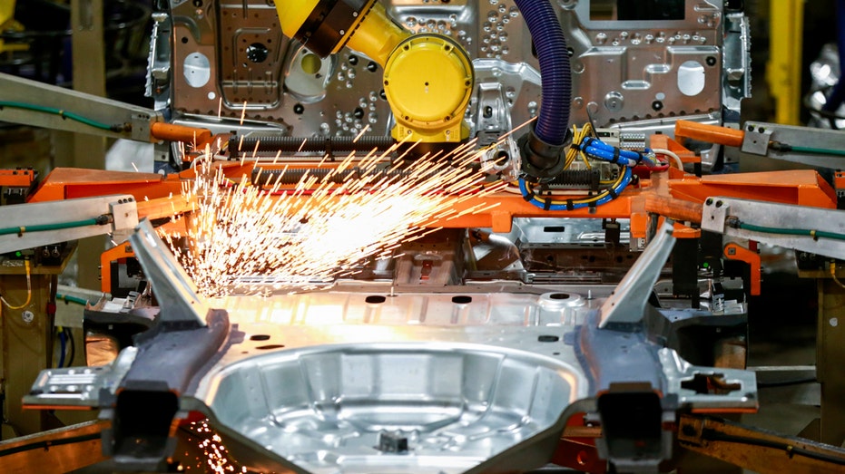 Machines work on a Ford vehicle assembly line at Ford's Chicago Assembly Plant in Chicago. 