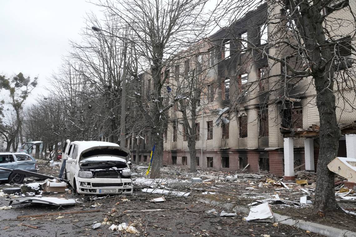 Damaged cars and a destroyed accommodation building are seen near a checkpoint in Brovary, outside Kyiv, Ukraine, Tuesday, March 1, 2022. Russian shelling pounded civilian targets in Ukraine's second-largest city Tuesday and a 40-mile convoy of tanks and other vehicles threatened the capital — tactics Ukraine's embattled president said were designed to force him into concessions in Europe's largest ground war in generations. (AP Photo/Efrem Lukatsky) EFREM LUKATSKY AP Read more at: https://www.sunherald.com/news/business/article258957128.html#storylink=cpy