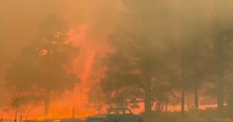 Wildfires rage in the West as storms also bring blizzard conditions and tornado threats