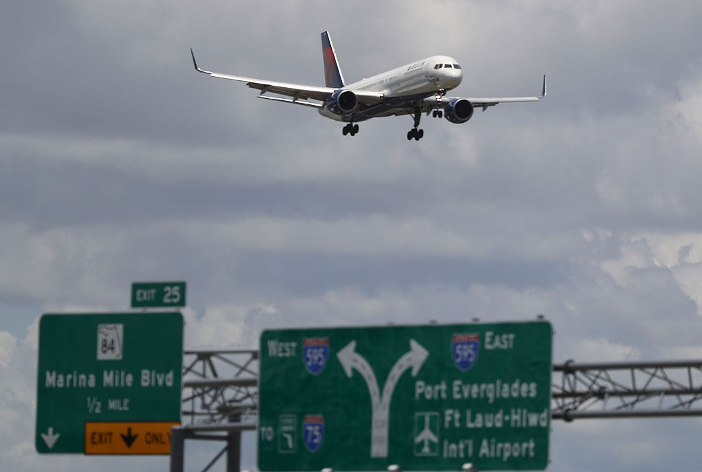 FORT LAUDERDALE, FL - JULY 14: A Delta airlines plane is seen as it comes in for a landing at the Fort Lauderdale-Hollywood International Airport on July 14, 2016 in Fort Lauderdale, Florida. Delta Air Lines Inc. reported that their second quarter earnings rose a better-than-expected 4.1%, and also announced that they decided to reduce its United States to Britian capacity on its winter schedule because of foreign currency issues and the economic uncertainty from Brexit. (Photo by Joe Raedle/Getty Images)