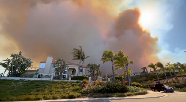 More than a dozen homes burning in wildfire near Laguna Beach