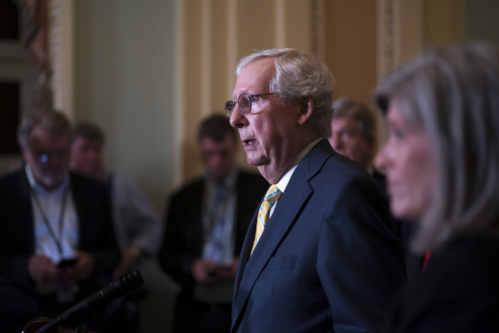 Senate Minority Leader Mitch McConnell, R-Ky., speaks with reporters following a closed-door policy lunch, at the Capitol in Washington, Tuesday, May 17, 2022. (AP Photo/J. Scott Applewhite)