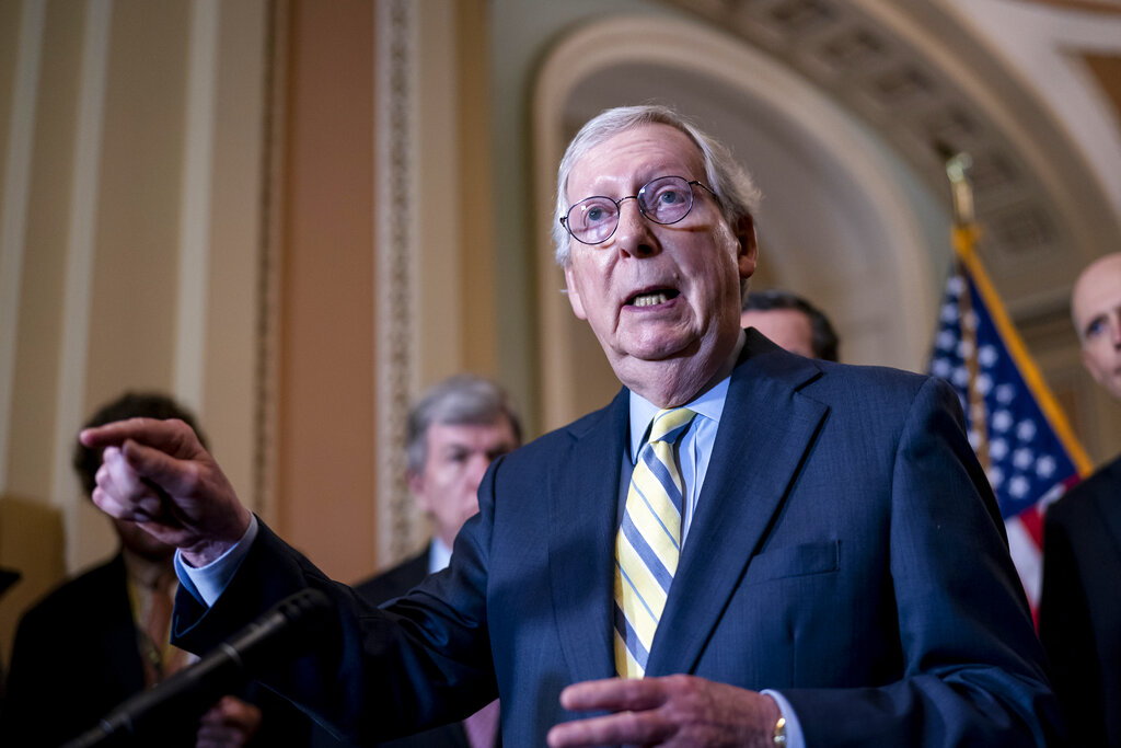 Senate Minority Leader Mitch McConnell, R-Ky., joined by the GOP leadership, meets with reporters at the Capitol in Washington, Tuesday, May 3, 2022. Reacting to reports that the Supreme Court could overturn the landmark 1973 Roe v. Wade case, McConnell said the leak should be investigated and punished to the fullest extent possible. (AP Photo/J. Scott Applewhite)