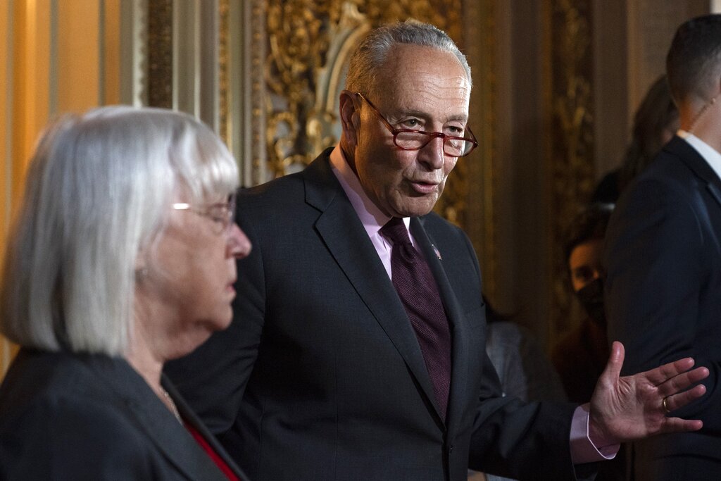 Senate Majority Leader Chuck Schumer of N.Y., right, and Sen. Patty Murray, D-Wash., speak to the media about a procedural vote that did not pass on the Women's Health Protection Act to codify the landmark 1973 Roe v. Wade decision that legalized abortion nationwide, Wednesday, May 11, 2022, on Capitol Hill in Washington. (AP Photo/Jacquelyn Martin)