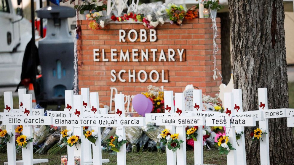 PHOTO: Crosses with the names of victims of a school shooting, are pictured at a memorial outside Robb Elementary school, after a gunman killed nineteen children and two teachers, in Uvalde, U.S. May 26, 2022. 