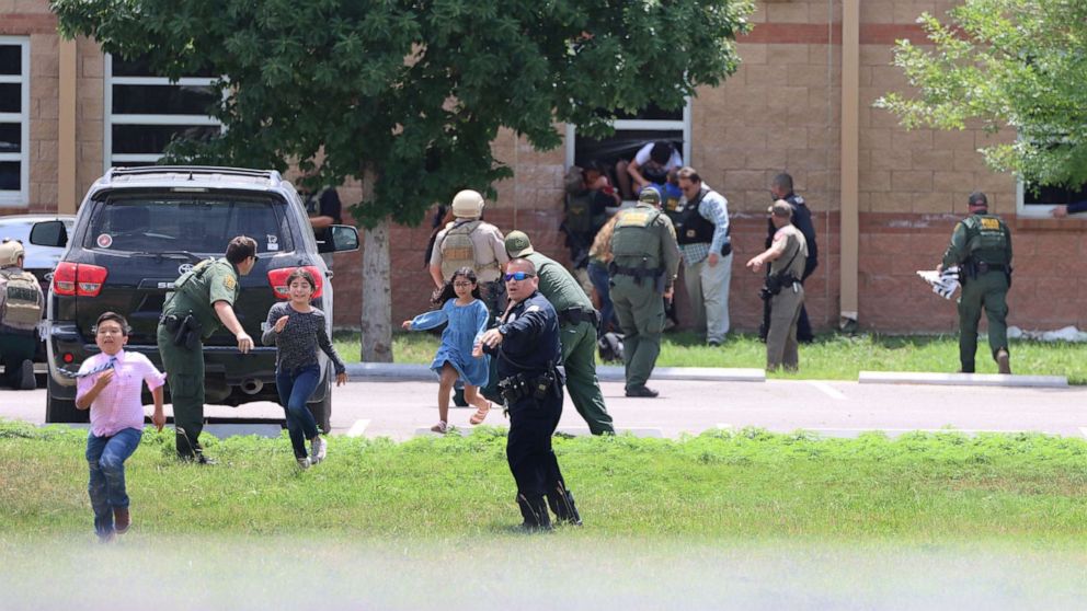 PHOTO: Students escape through a window during the mass shooting at Robb Elementary School, May 24, 2022, in Uvalde, Texas. 