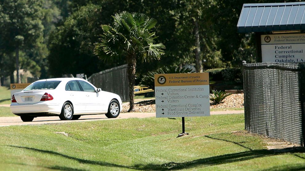 PHOTO: A person drives through the gates of a federal prison in Oakdale, La., Sept. 26, 2006.