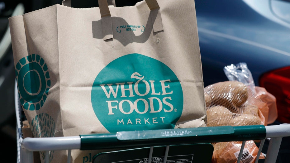 Whole Foods bag in shopping cart