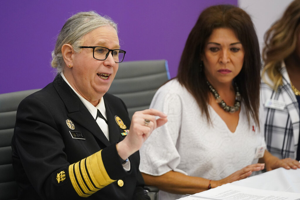 Department of Health and Human Services Assistant Secretary for Health, Adm. Rachel Levine, left, speaks after having attended a roundtable on gender-affirming care and transgender health, along with Arianna Inurritegui-Lint, right, CEO and founder of Arianna's Center, Wednesday, June 29, 2022, in Miami. (AP Photo/Wilfredo Lee)