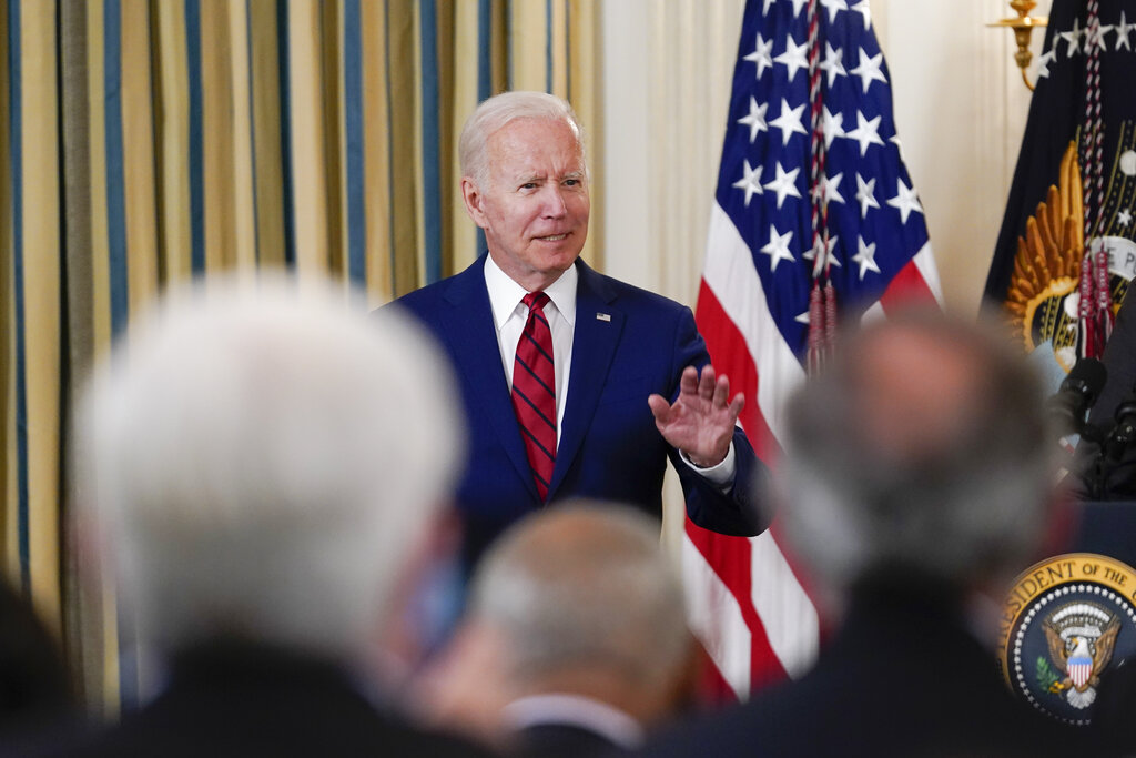 President Joe Biden arrives to speak and sign into law nine bipartisan bills that will honor and improve care for America's veterans during an event in the State Dining room of the White House in Washington, Tuesday, June 7, 2022. (AP Photo/Susan Walsh)