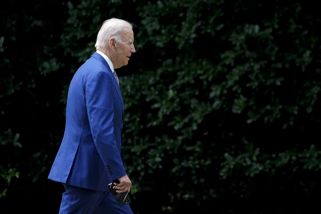 President Joe Biden walks to the Oval Office of the White House after stepping off Marine One, Tuesday, June 14, 2022, in Washington. Biden is returning to Washington after speaking at the AFL-CIO convention in Philadelphia. (AP Photo/Patrick Semansky)