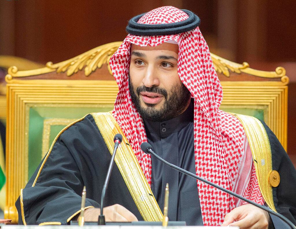 FILE - In this photo released by Saudi Royal Palace, Saudi Crown Prince Mohammed bin Salman, speaks during the Gulf Cooperation Council (GCC) Summit in Riyadh, Saudi Arabia, Dec. 14, 2021. After President Joe Biden took office, his administration made clear the president would avoid direct engagement with the country's defacto leader, Crown Prince Mohammed bin Salman, after U.S. intelligence officials concluded that he likely approved the 2018 killing and dismemberment of U.S.-based journalist Jamal Khashoggi. (Bandar Aljaloud/Saudi Royal Palace via AP, File)