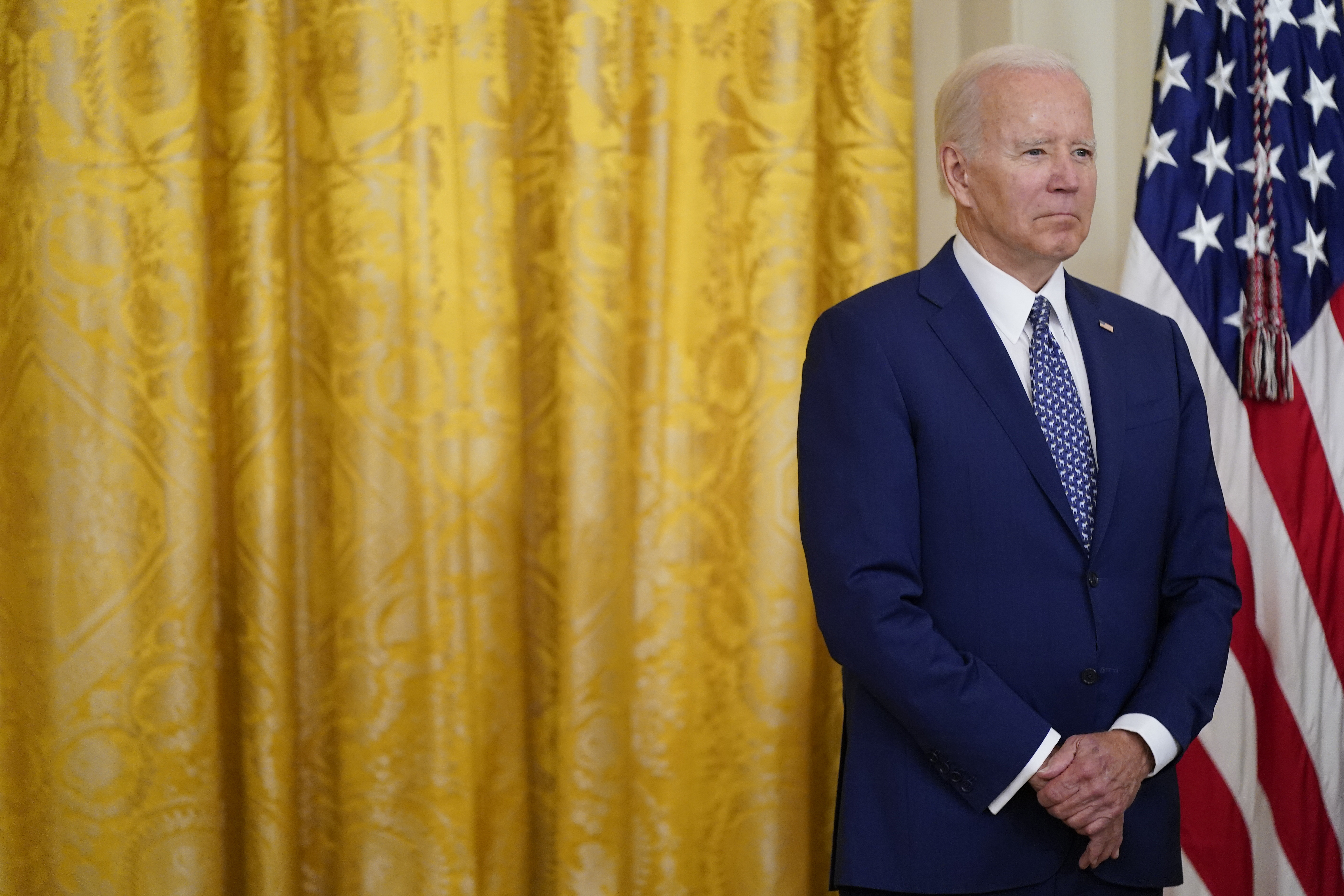 FILE - President Joe Biden waits to speak during a bill signing ceremony, June 13, 2022, in the East Room of the White House in Washington. Biden will make his first trip to the Middle East next month with visits to Israel, the West Bank and Saudi Arabia. (AP Photo/Patrick Semansky, File)