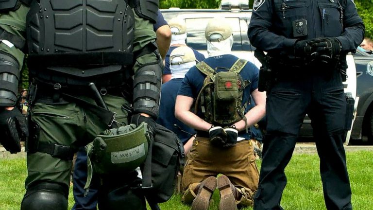 Dozens of masked men arrested near Idaho pride event