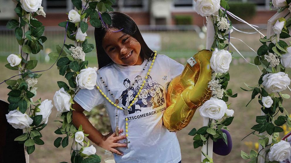 PHOTO: A photo cutout of Amerie Jo Garza, one of the 19 children killed victims in the Robb Elementary school shooting, is seen at school memorial site on the day of her funeral in Uvalde, Texas, May 31, 2022.