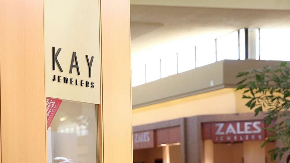 PHOTO: Shoppers walk by a Kay Jewelers and Zales Jewelers stores in Daly City, Calif., Feb. 19, 2014.