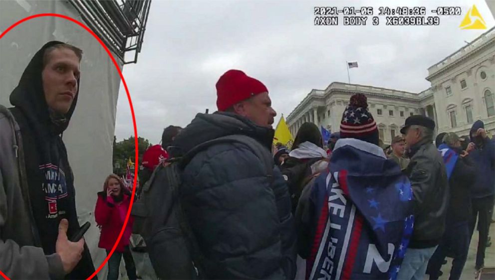 Officer bodycam shows Jason Sywak of New York outside the U.S. Capitol on Jan. 6, 2021, according to the Justice Department. Sywak and his father Michael were sentenced to home detention and probation for their participation in the riot at the Capitol. 