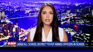 Large N.J. school district to put armed officers in school
