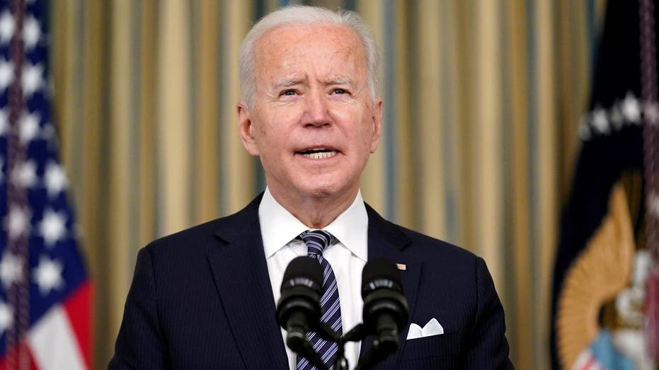 President Joe Biden speaks about the COVID-19 relief package in the State Dining Room of the White House.