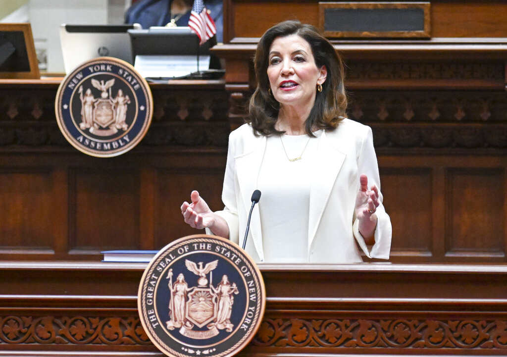 New York Gov. Kathy Hochul delivers her first State of the State address in the Assembly Chamber at the state Capitol, Wednesday, Jan. 5, 2022, in Albany, N.Y. (AP Photo/Hans Pennink, Pool)