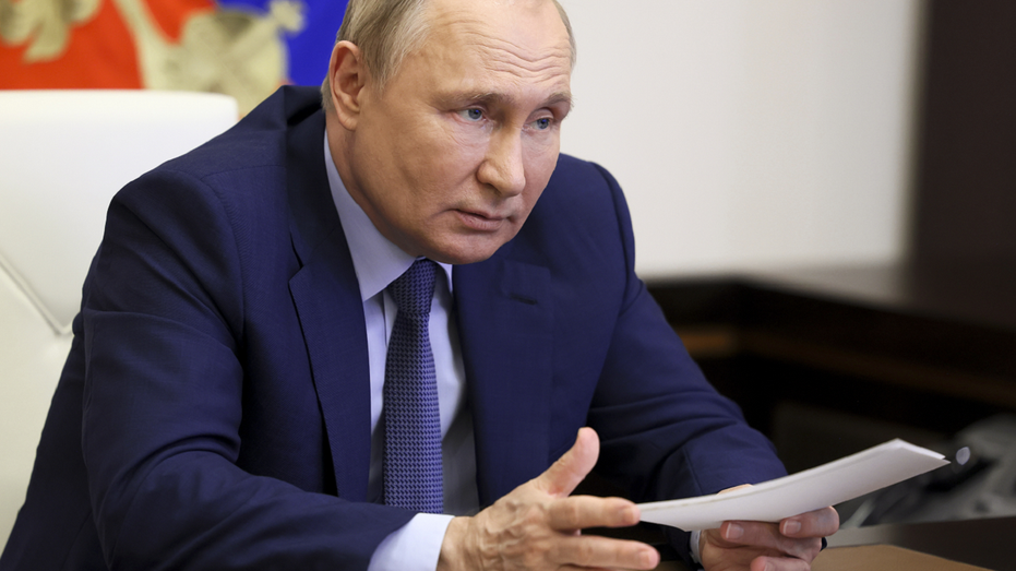 Russian President Vladimir Putin holds a meeting near Moscow