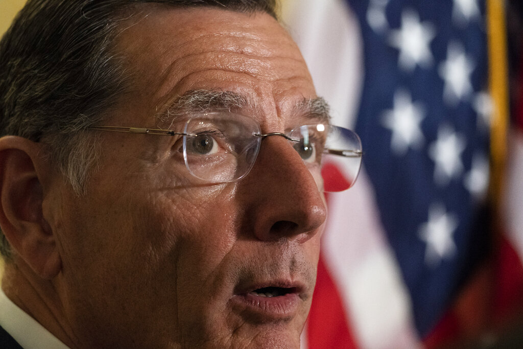 Sen. John Barrasso, R-Wyo., speaks with reporters after a Republican caucus luncheon on Capitol Hill, Tuesday, June 8, 2021, in Washington. (AP Photo/Alex Brandon)