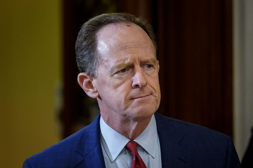 WASHINGTON, DC - JANUARY 30: Sen. Pat Toomey (R-PA) leaves the Senate chamber during a recess in the Senate impeachment trial of U.S. President Donald Trump continues at the U.S. Capitol on January 30, 2020 in Washington, DC. On Thursday, Senators continue asking questions for the House impeachment managers and the president's defense team. (Photo by Drew Angerer/Getty Images)