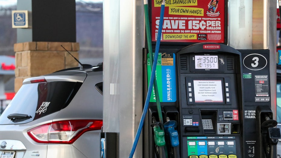 Car filling up gas tank at Sheetz