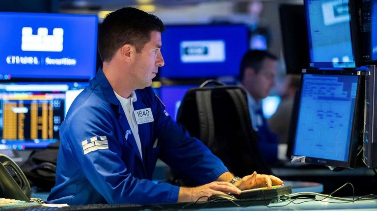 Stock futures trade mixed to start the new month