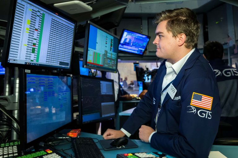 Stocks fall slightly as investors assess Target’s profit warning