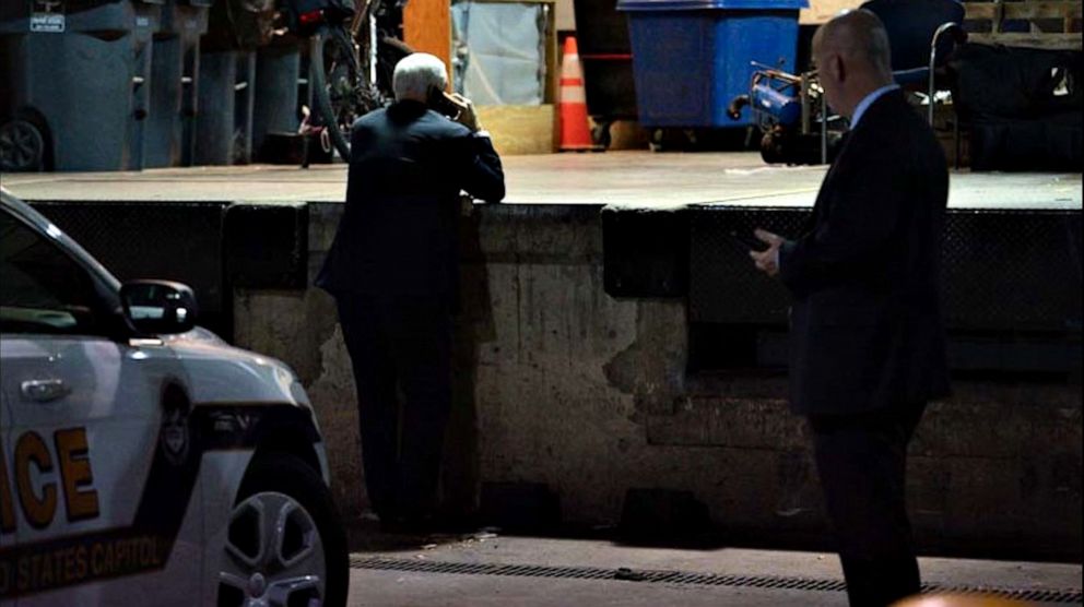 PHOTO: A photo taken on Jan. 6, 2021 shows Vice President Mike Pence looking at a tweet by President Donald Trump in an underground parking garage of the U.S. Capitol.