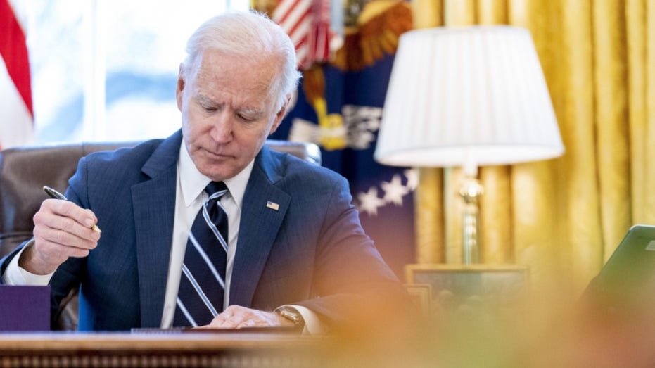 President Biden signs document