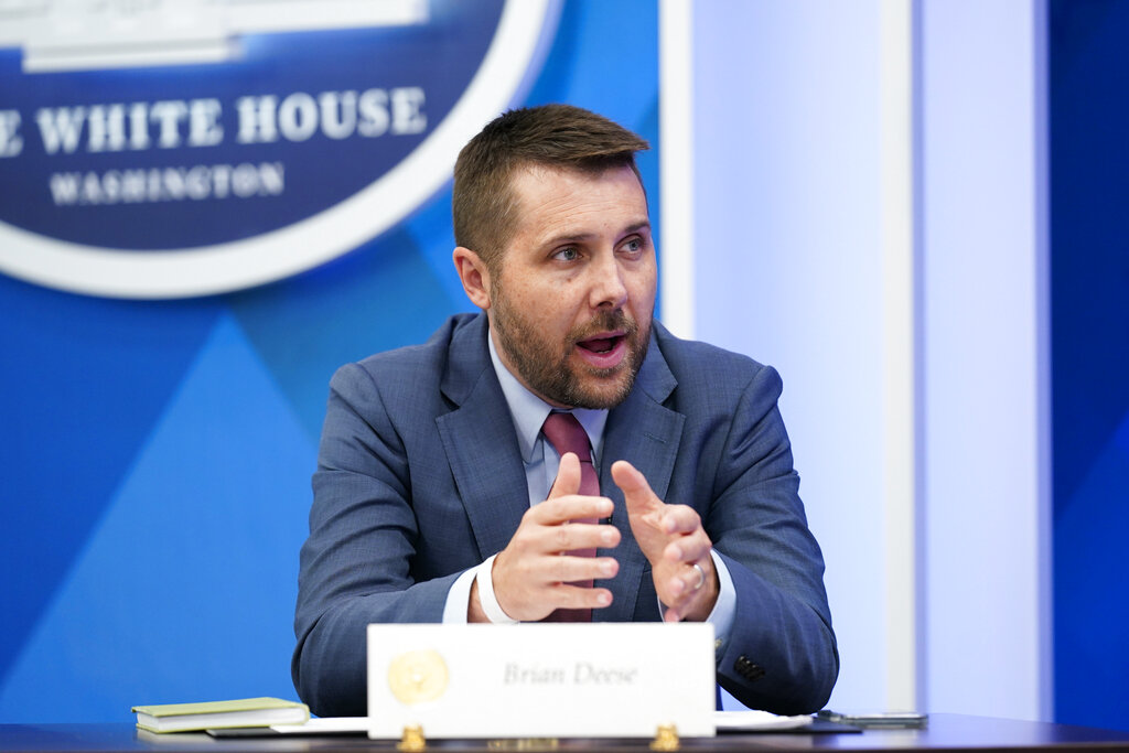 Brian Deese, Assistant to the President and Director of the National Economic Council, speaks during a meeting where President Joe Biden appeared virtually with his economic team in the South Court Auditorium on the White House complex in Washington, Friday, July 22, 2022. (AP Photo/Andrew Harnik)