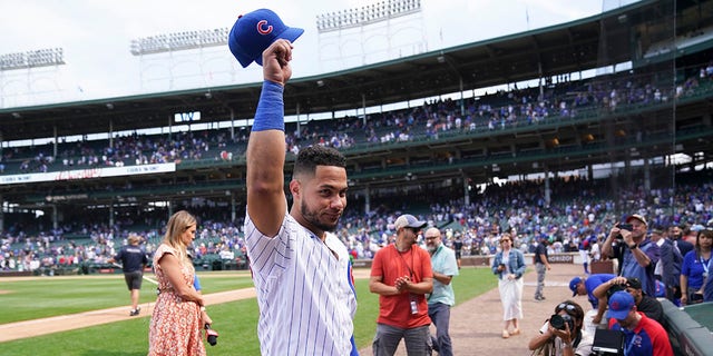 Willson Contreras of the Cubs waves as he heads to the clubhouse following his team's win over the Pittsburgh Pirates at Wrigley Field on July 26, 2022, in Chicago.