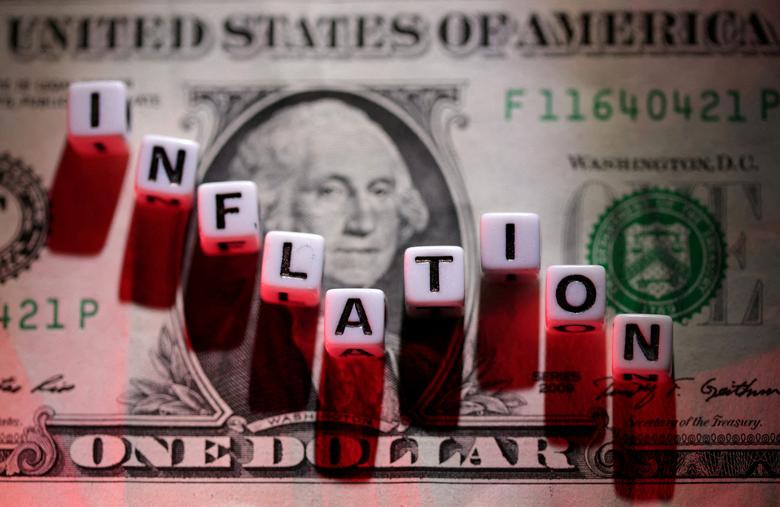 FILE PHOTO: Plastic letters arranged to read "Inflation" are placed on U.S. Dollar banknote in this illustration taken, June 12, 2022. REUTERS/Dado Ruvic/Illustration
