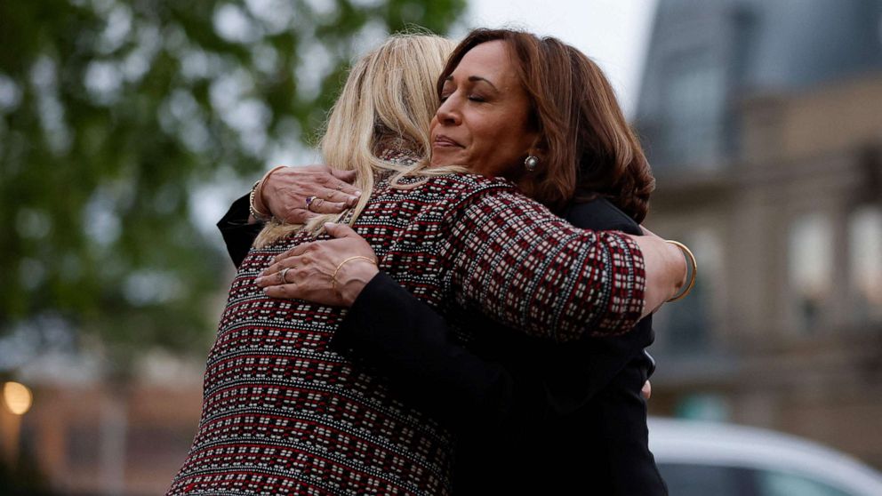 PHOTO: Vice President Kamala Harris hugs Highland Park Mayor Nancy Rotering as she makes a visit to the site of a mass shooting in Highland Park, Ill., July 5, 2022. 