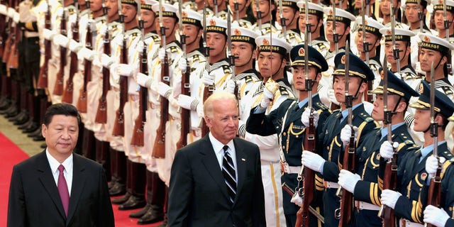 Joe Biden, then vice president, and Chinese President Xi Jinping. (Photo by Lintao Zhang/Getty Images)