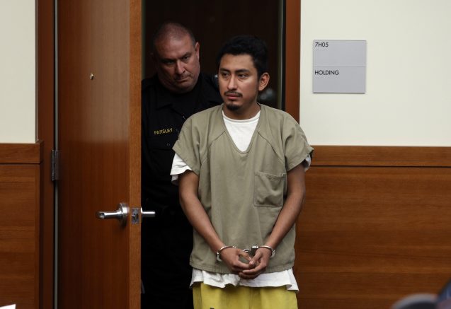 Gerson Fuentes, right, the man accused of raping a 10-year-old girl who then traveled to Indiana to have an abortion, enters Franklin County common pleas court for his bond hearing in Columbus, Ohio, Thursday, July 28, 2022. Judge Julie Lynch denied bond. (AP Photo/Paul Vernon)