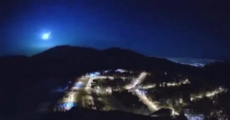Meteor streaks across night sky above Santiago, Chile