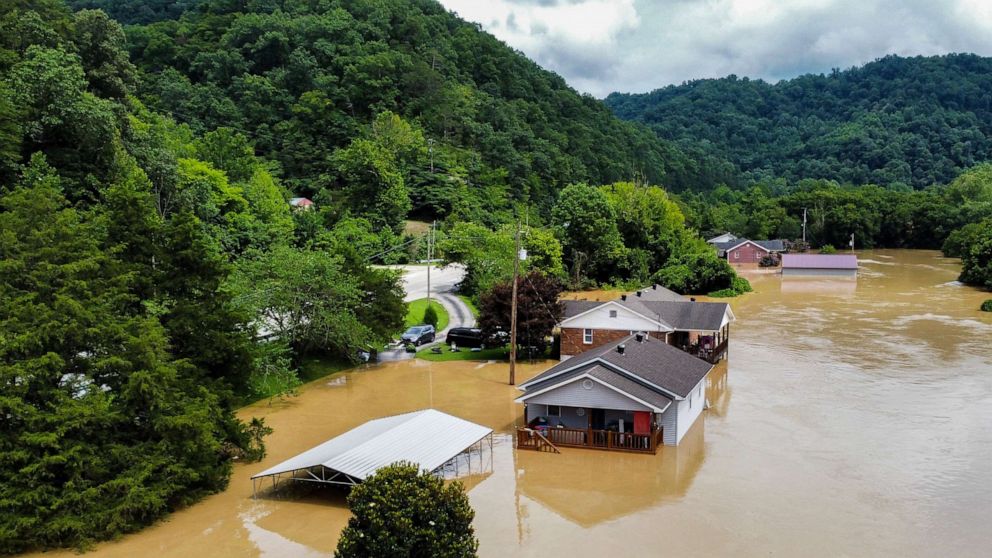 PHOTO: JHomes along Gross Loop off of KY-15 are flooded with water from the North Fork of the Kentucky River in Jackson, Ky., July 28, 2022.