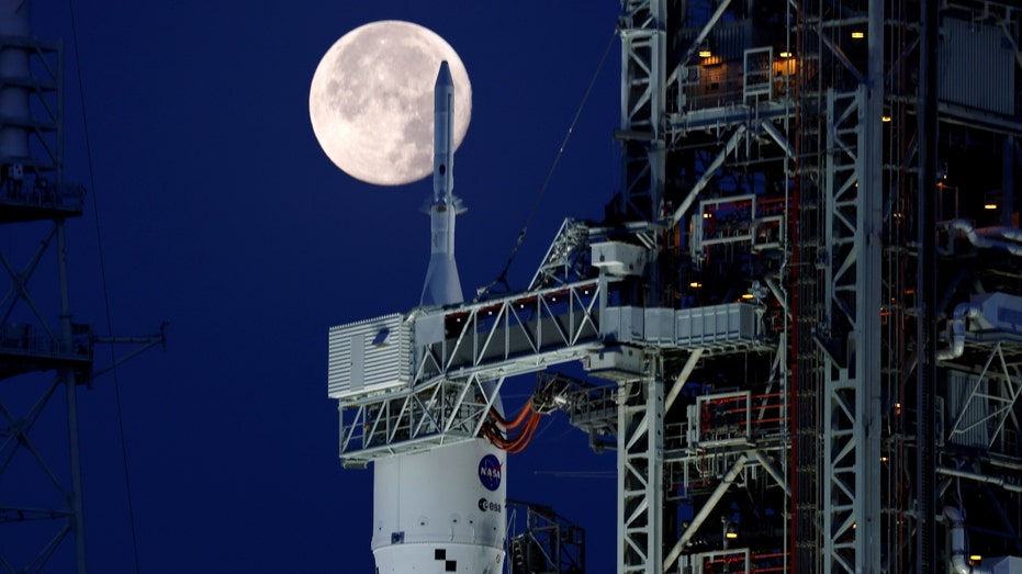 The NASA Space Launch System (SLS) rocket and the Strawberry Moon