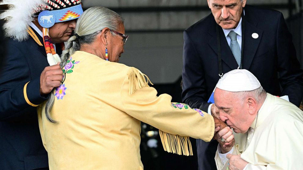PHOTO: Pope Francis greets members of an indigenous tribe during his welcoming ceremony at Edmonton International Airport in Alberta, western Canada, July 24, 2022.