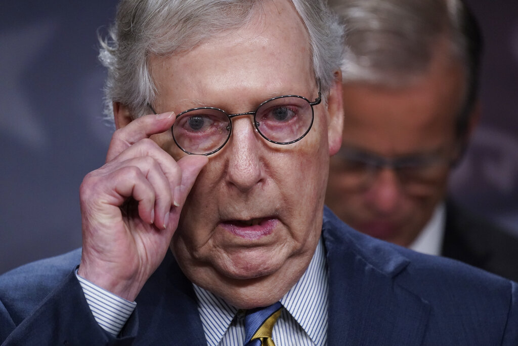 Senate Minority Leader Mitch McConnell, R-Ky., speaks with reporters following a closed-door caucus lunch, at the Capitol in Washington, Tuesday, July 19, 2022. (AP Photo/J. Scott Applewhite)