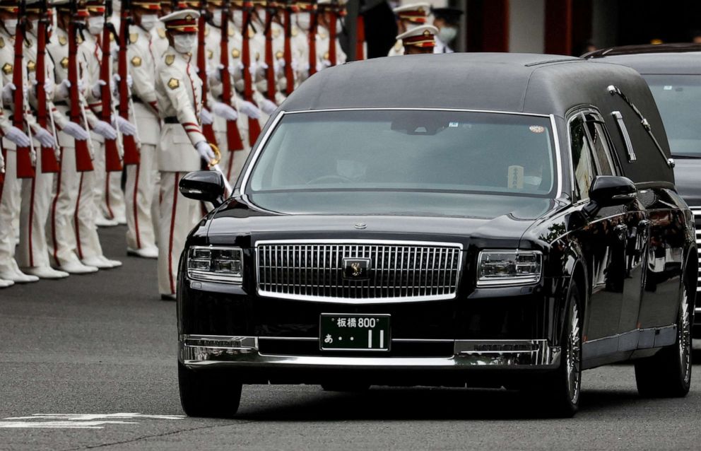 PHOTO: Akie Abe, wife of late former Japanese Prime Minister Shinzo Abe, sits in a vehicle carrying Abe's body, as she leaves after his funeral at Zojoji Temple in Tokyo, Japan, on July 12, 2022.