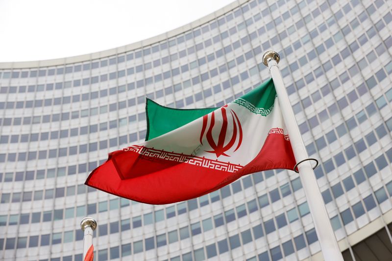 An Iranian flag waves at the headquarters of the International Atomic Energy Agency in Vienna. © Reuters